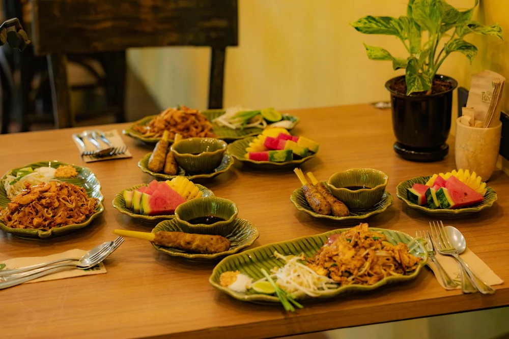 A selection of plated dishes on a table at Sky Rock